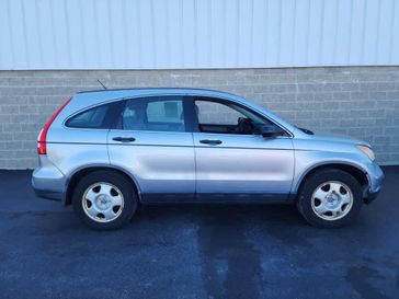 2007 Honda CR-V LX in a Glacier Blue Metallic exterior color and Blackinterior. Wilmington Auto Center Chrysler Dodge Jeep Ram (937) 556-6430 wilmingtonautocentercdjr.com 