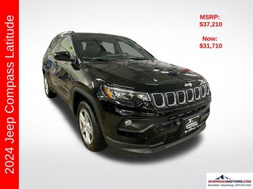 2024 Jeep Compass Latitude 4x4 in a Diamond Black Crystal Pearl Coat exterior color and Blackinterior. Sheridan Motors CDJR 307-218-2217 sheridanmotor.com 