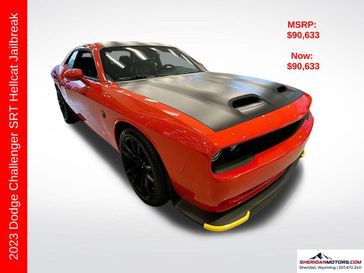 2023 Dodge Challenger SRT Hellcat Jailbreak in a Go Mango exterior color and Blackinterior. Sheridan Motors CDJR 307-218-2217 sheridanmotor.com 