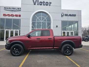 2021 RAM 1500 Classic Warlock in a Delmonico Red Pearl Coat exterior color and Blackinterior. Victor Chrysler Dodge Jeep Ram 585-236-4391 victorcdjr.com 