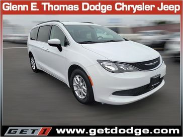 2021 Chrysler Voyager LXI in a Bright White Clear Coat exterior color and Black/Alloyinterior. Glenn E Thomas 100 Years Of Excellence (866) 340-5075 getdodge.com 