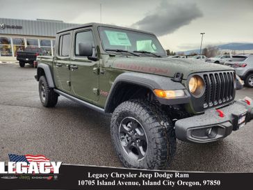 2023 Jeep Gladiator Rubicon 4x4 in a Sarge Green Clear Coat exterior color and Blackinterior. Legacy Chrysler Jeep Dodge RAM 541-663-4885 legacychryslerjeepdodgeram.com 