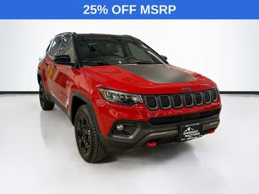 2023 Jeep Compass Trailhawk 4x4 in a Redline Pearl Coat exterior color and Ruby Red/Blackinterior. Sheridan Motors Auto (307) 218-2217 sheridanmotors.com 
