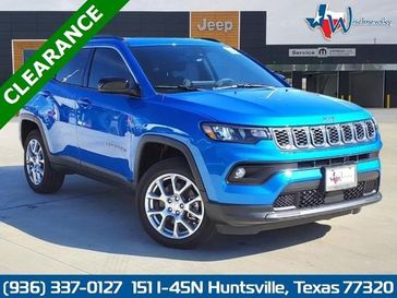2024 Jeep Compass Latitude Lux 4x4 in a Laser Blue Pearl Coat exterior color. Wischnewsky Dodge 936-755-5310 wischnewskydodge.com 