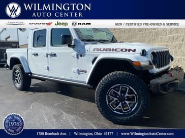 2024 Jeep Gladiator Rubicon X 4x4 in a Bright White Clear Coat exterior color and Blackinterior. Wilmington Auto Center Chrysler Dodge Jeep Ram (937) 556-6430 wilmingtonautocentercdjr.com 