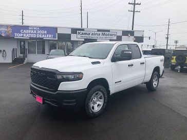 New 2025 RAM 1500 Tradesman Quad Cab 4x4 6'4' Box in a Bright White Clear Coat exterior color. Kamaaina Motors 1-808-746-7956 kamaainamotors.com 