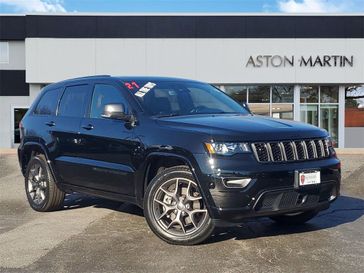 2021 Jeep Grand Cherokee 80th Anniversary Edition in a Diamond Black Crystal Pearl Coat exterior color and Blackinterior. Lotus of Glenview 847-904-1233 lotusofglenview.com 