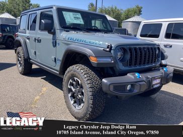 2024 Jeep Wrangler 4-door Rubicon 4xe in a Anvil Clear Coat exterior color and Blackinterior. Legacy Chrysler Jeep Dodge RAM 541-663-4885 legacychryslerjeepdodgeram.com 