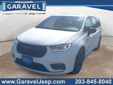 2023 Chrysler Pacifica Plug-in Hybrid Limited in a Bright White Clear Coat exterior color and Blackinterior. Garavel Jeep 475-258-7987 norwalkjeep.com 