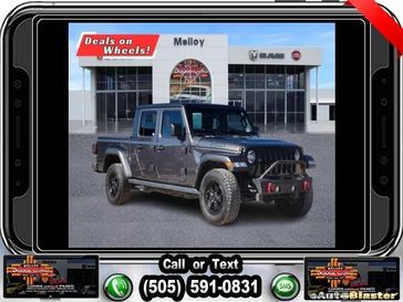 2021 Jeep Gladiator Sport in a Granite Crystal Metallic Clear Coat exterior color and Blackinterior. Melloy Dodge RAM FIAT 505-588-4459 melloydodge.com 