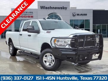 2024 RAM 2500 Tradesman Crew Cab 4x4 8' Box in a Bright White Clear Coat exterior color and Diesel Gray/Blackinterior. Wischnewsky Dodge 936-755-5310 wischnewskydodge.com 