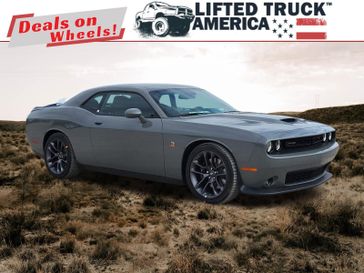 2023 Dodge Challenger R/T Scat Pack in a Destroyer Gray Clear Coat exterior color and Blackinterior. Lifted Truck America 888-267-0644 liftedtruckamerica.com 