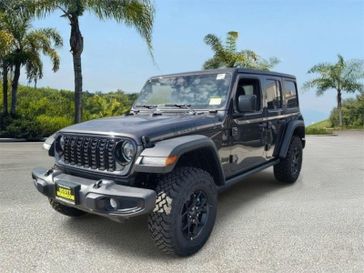 New 2026 Jeep Wrangler Willys in a Gray exterior color and Blackinterior. Southbay Chrysler Jeep Dodge Ram (424) 404-5521 pixelmotiondemo.com 