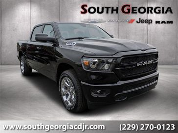 2024 RAM 1500 Tradesman Crew Cab 4x4 5'7' Box in a Diamond Black Crystal Pearl Coat exterior color and Blackinterior. South Georgia CDJR 229-443-1466 southgeorgiacdjr.com 