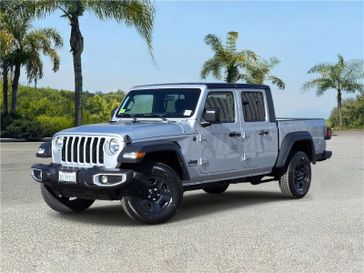 Used 2023 Jeep Gladiator Sport 4x4 in a Silver Zynith Clear Coat exterior color and Blackinterior. Southbay Chrysler Jeep Dodge Ram (424) 404-5521 pixelmotiondemo.com 