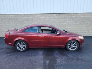 2011 Volvo C70 Base in a Flamenco Red Metallic exterior color and Off-Blackinterior. Wilmington Auto Center Chrysler Dodge Jeep Ram (937) 556-6430 wilmingtonautocentercdjr.com 