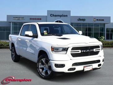 2024 RAM 1500 Laramie Crew Cab 4x2 5'7' Box in a Bright White Clear Coat exterior color and LEATHER TRIMMEDinterior. Champion Chrysler Jeep Dodge Ram 800-549-1084 pixelmotiondemo.com 