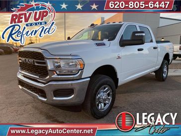 2024 RAM 2500 Tradesman Crew Cab 4x4 6'4' Box in a Bright White Clear Coat exterior color and Blackinterior. Legacy Auto Center 620-315-9264 legacyautocenter.net 