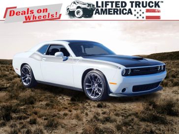 2023 Dodge Challenger R/T in a White Knuckle Clear Coat exterior color and Blackinterior. Lifted Truck America 888-267-0644 liftedtruckamerica.com 