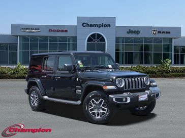 2024 Jeep Wrangler 4-door Sahara in a Black Clear Coat exterior color and CLOTHinterior. Champion Chrysler Jeep Dodge Ram 800-549-1084 pixelmotiondemo.com 