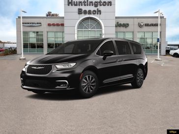 2023 Chrysler Pacifica Hybrid Limited in a Brilliant Black Crystal Pearl Coat exterior color and Black/Alloy/Blackinterior. BEACH BLVD OF CARS beachblvdofcars.com 