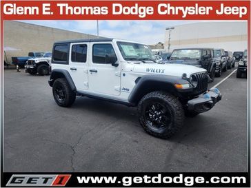 2024 Jeep Wrangler 4-door Willys 4xe in a Bright White Clear Coat exterior color and Blackinterior. Glenn E Thomas 100 Years Of Excellence (866) 340-5075 getdodge.com 