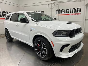 2023 Dodge Durango Srt Hellcat Plus Awd in a White Knuckle Clear Coat exterior color and Demonic Red/Blackinterior. Marina Auto Group (855) 564-8688 marinaautogroup.com 