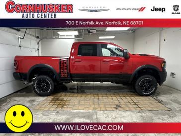 2023 RAM 2500 Power Wagon Crew Cab 4x4 6'4' Box in a Flame Red Clear Coat exterior color and Blackinterior. Cornhusker Auto Center 402-866-8665 cornhuskerautocenter.com 