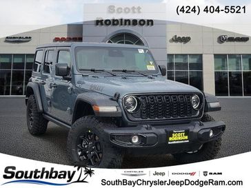 New 2026 Jeep Wrangler Willys in a Gray exterior color and Blackinterior. Southbay Chrysler Jeep Dodge Ram (424) 404-5521 pixelmotiondemo.com 