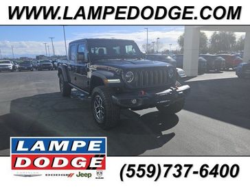 2024 Jeep Gladiator Rubicon 4x4 in a Black Clear Coat exterior color and Blackinterior. Lampe Chrysler Dodge Jeep RAM 559-471-3085 pixelmotiondemo.com 