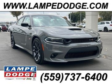 2023 Dodge Charger Scat Pack in a Destroyer Gray exterior color and Blackinterior. Lampe Chrysler Dodge Jeep RAM 559-471-3085 pixelmotiondemo.com 