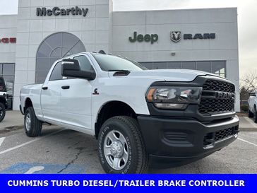 2024 RAM 3500 Tradesman Crew Cab 4x4 6'4' Box in a Bright White Clear Coat exterior color and Diesel Gray/Blackinterior. McCarthy Jeep Ram 816-434-0674 mccarthyjeepram.com 