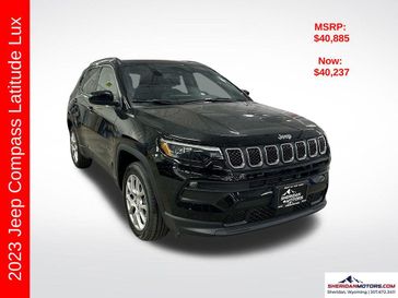 2023 Jeep Compass Latitude Lux 4x4 in a Diamond Black Crystal Pearl Coat exterior color and Blackinterior. Sheridan Motors CDJR 307-218-2217 sheridanmotor.com 