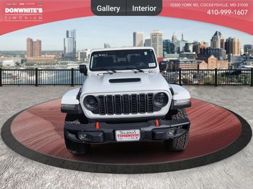 2024 Jeep GLADIATOR MOJAVE X 4X4 in a Bright White Clear Coat exterior color. Don White's Timonium Chrysler Dodge Jeep Ram 410-881-5409 donwhites.com 