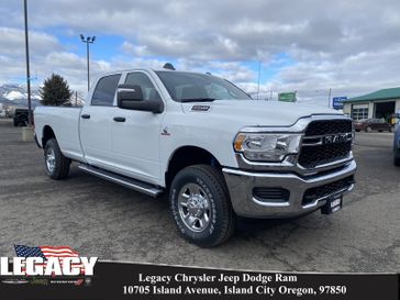 2024 RAM 2500 Tradesman Crew Cab 4x4 8' Box in a Bright White Clear Coat exterior color and Blackinterior. Legacy Chrysler Jeep Dodge RAM 541-663-4885 legacychryslerjeepdodgeram.com 