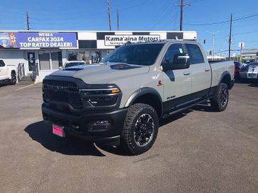 New 2026 RAM 2500 Rebel Crew Cab 4x4 6'4' Box in a Ceramic Gray Clear Coat exterior color. Kamaaina Motors 1-808-746-7956 kamaainamotors.com 