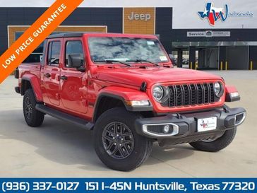 2024 Jeep Gladiator Sport S 4x4 in a Firecracker Red Clear Coat exterior color. Wischnewsky Dodge 936-755-5310 wischnewskydodge.com 