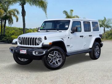 New 2025 Jeep Wrangler 4-door Sahara in a Bright White Clear Coat exterior color and Blackinterior. Southbay Chrysler Jeep Dodge Ram (424) 404-5521 pixelmotiondemo.com 