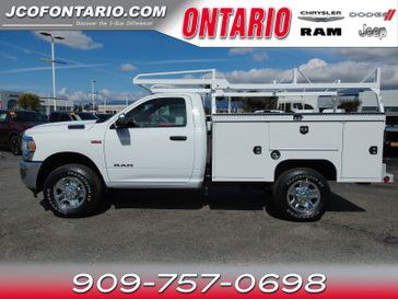 2022 RAM 2500 Tradesman in a Bright White Clear Coat exterior color and Diesel Gray/Blackinterior. Ontario Auto Center ontarioautocenter.com 