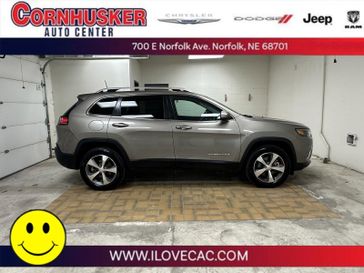 2020 Jeep Cherokee Limited in a Light Brownstone Pearl Coat exterior color and Blackinterior. Cornhusker Auto Center 402-866-8665 cornhuskerautocenter.com 