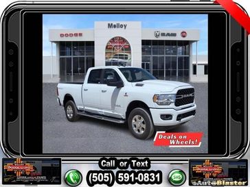 2024 RAM 2500 Big Horn Crew Cab 4x4 6'4' Box in a Bright White Clear Coat exterior color and Blackinterior. Melloy Dodge RAM FIAT 505-588-4459 melloydodge.com 