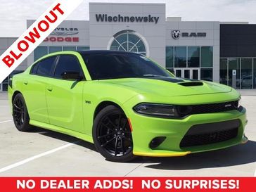 2023 Dodge Charger Scat Pack in a Sublime exterior color and Blackinterior. Wischnewsky Dodge 936-755-5310 wischnewskydodge.com 