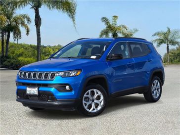 Used 2025 Jeep Compass Latitude 4x4 in a Hydro Blue Pearl Coat exterior color and Blackinterior. Southbay Chrysler Jeep Dodge Ram (424) 404-5521 pixelmotiondemo.com 