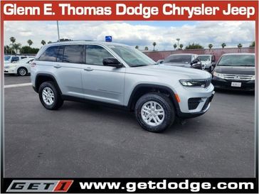 2023 Jeep Grand Cherokee Laredo 4x4 in a Silver Zynith exterior color and Global Blackinterior. Glenn E Thomas 100 Years Of Excellence (866) 340-5075 getdodge.com 