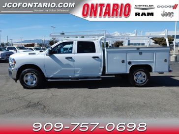 2023 RAM 2500 Tradesman in a Bright White Clear Coat exterior color and Diesel Gray/Blackinterior. Ontario Auto Center ontarioautocenter.com 