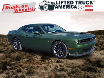2023 Dodge Challenger R/T Scat Pack in a F8 Green exterior color and Blackinterior. Lifted Truck America 888-267-0644 liftedtruckamerica.com 