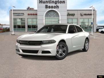 2023 Dodge Charger SXT in a White Knuckle exterior color and Blackinterior. BEACH BLVD OF CARS beachblvdofcars.com 