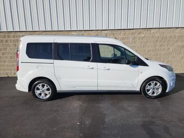 2015 Ford Transit Connect XLT in a Frozen White exterior color and Charcoal Blackinterior. Wilmington Auto Center Chrysler Dodge Jeep Ram (937) 556-6430 wilmingtonautocentercdjr.com 