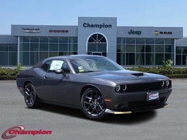 2023 Dodge Challenger Gt in a Granite exterior color and HOUNDSTOOTHinterior. Champion Chrysler Jeep Dodge Ram 800-549-1084 pixelmotiondemo.com 