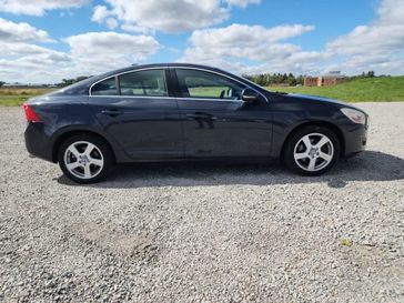 2013 Volvo S60 T5 in a Caspian Blue Metallic exterior color and Charcoal/Off-Blackinterior. Wilmington Auto Center Chrysler Dodge Jeep Ram (937) 556-6430 wilmingtonautocentercdjr.com 